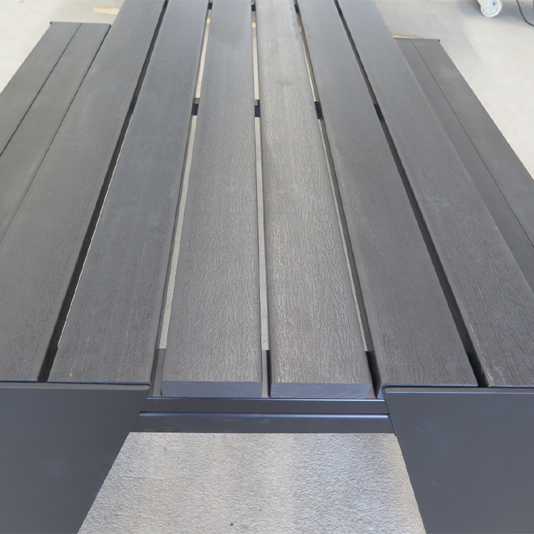 Sleek matte black steel outdoor picnic table for contemporary plazas